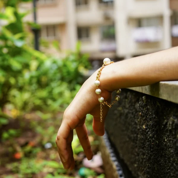 Evermore Pearl Rakhi Bracelet worn