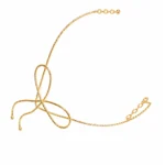 Golden kids bow hair clip with bow detail, ANIKI hair accessory for girls