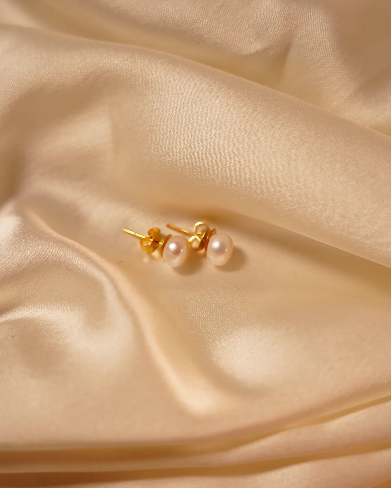 Pearl Glow Studs worn