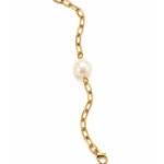 Gold-tone Pearl Link Rakhi, a pearl rakhi bracelet with a single pearl centrepiece, on white background
