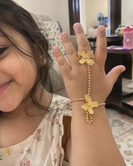 Child wearing the ANIKI Butterfly Hand Harness